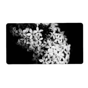 Etiqueta flores negras y blancas