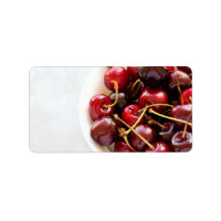 Fotografía de Cerezas Rojas Frescas en un Tazón