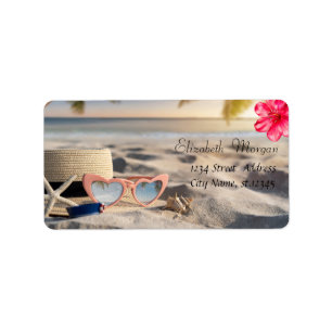 Etiqueta Gafas de sol Sombrero Conchas de mar Arena Hibisco