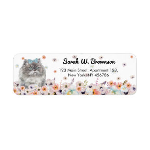 Etiqueta gato himalayo ojos azules pajarita sentada flores