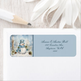 Etiqueta Hombre de nieve vestido con bufanda azul y tófat