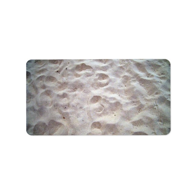 Etiqueta Huellas sobre la textura de arena (Frente)