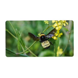 Etiqueta Manosee la abeja en vuelo