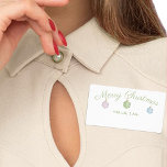 Etiqueta Merry Christmas Fiesta Ornaments Paper Name Tag<br><div class="desc">Si estás planeando una fiesta de vacaciones en la que la mayoría de los clientes no se conocerán estos nombres de etiquetas de papel son una manera de facilitar la presentación torpe. Esta etiqueta presenta adornos navideños de color no tradicional de moda en verde pastel, rosa y azul con estrellas...</div>