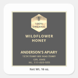 Etiqueta moderna de tarro de miel de abeja dorada