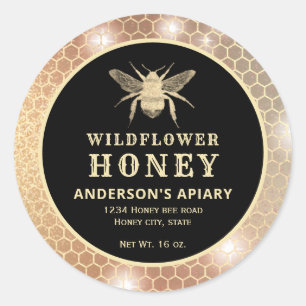 Etiqueta moderna de tarro de miel de abeja dorada