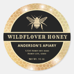 Etiqueta moderna de tarro de miel de abeja dorada