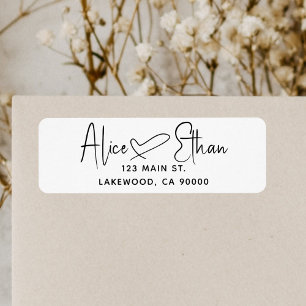 Etiqueta moderna del corazón del guión de la firma