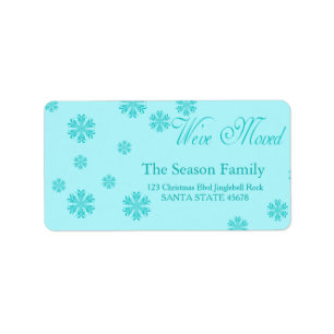 Etiqueta navidades de copos de nieve azules "hemos movido"