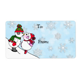 Etiqueta Navidades Snowman y una mujer besan hacia y desde
