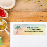 Etiqueta Palm Tree return address<br><div class="desc">These island style return address labels are decorated with a hand painted palm tree decorated with lights and baubles on a watercolor background.
Easily customizeable with your details.</div>