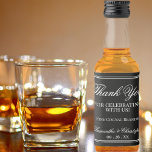 Etiqueta Para Botella De Licor Elegancia simple Boda Gracias Mini Negro<br><div class="desc">Estas etiquetas de botellas de licor en miniatura son perfectas como favores de boda o regalos para invitados, familiares o miembros de tu fiesta nupcial. Presentan un diseño sencillo pero elegante con letras blancas en un fondo negro. El texto dice: Gracias por celebrar con nosotros. Hay espacio para los nombres...</div>