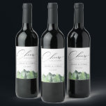 Etiqueta Para Botella De Vino Boda en la montaña del bosque rústico<br><div class="desc">Bosque de madera de acuarela elegante y escena de montaña de estilo rústico chic,  etiquetas de vino personalizadas.  Gráfico de caligrafía elegante "Cheers" con estilo de diseño moderno que proporciona líneas para nombres,  fecha del evento y frase.</div>