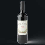 Etiqueta Para Botella De Vino Holly Evergreen Merry Christmas<br><div class="desc">Feliz Navidad con una fuente cursiva verde oscuro con bayas rojas y toques de ramas verdes. Personalice su nombre o mensaje con letras de letra rojas coincidentes. Está en blanco crudo.</div>
