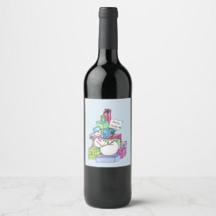 Etiqueta Para Botella De Vino Muñeco de nieve relajándose sobre regalos