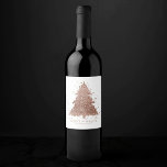 Etiqueta Para Botella De Vino Posh Merry Christmas | Glam Rosa Gold Tree Persona<br><div class="desc">¡Es temporada de diversión! Glamoroso cobre metálico falso e impresionante paleta de oro rosa árbol abstracto y fiesta de vacaciones con letras a mano "Feliz Navidad", alojamiento y colección de accesorios de regalo. Este divertido diseño festivo presenta un llamativo y brillante árbol de Navidad con una bandeja de pintura friki...</div>