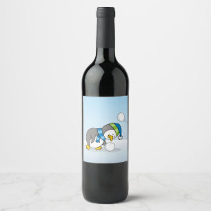 Etiqueta Para Botella De Vino Un pingüino con una bola de nieve