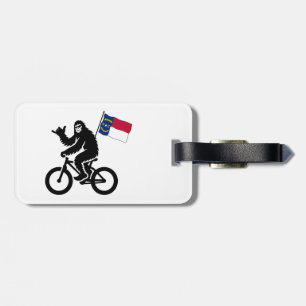 Etiqueta Para Maletas Bigfoot en bicicleta bandera de Carolina del Norte