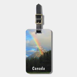 Etiqueta Para Maletas Cielos tormentosos y arcoiris sobre montaña nevada