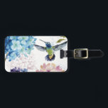 Etiqueta Para Maletas Flores de primavera<br><div class="desc">© Lisa Audit / Wild Apple. La imagen presenta flores de colores en flor. También se puede ver un colibrí en vuelo en la imagen.</div>