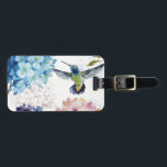 Etiqueta Para Maletas Flores de primavera<br><div class="desc">© Lisa Audit / Wild Apple. La imagen presenta flores de colores en flor. También se puede ver un colibrí en vuelo en la imagen.</div>