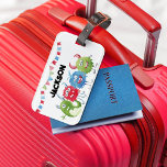 Etiqueta Para Maletas Foto de niños monstruos<br><div class="desc">Esta etiqueta de equipaje con tema de monstruo es perfecta para los niños que van de vacaciones. La etiqueta incluye 4 monstruos en tonos verdes, azules y rojos, y el lienzo y su nombre. Los estilos de fuente, tamaños y colores pueden cambiarse después de la personalización haciendo clic en el...</div>