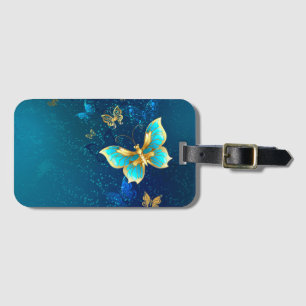 Etiqueta Para Maletas Mariposas doradas sobre fondo azul