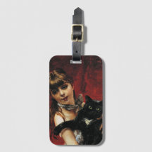 Niña con un gato negro en sus brazos
