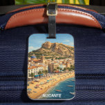 Etiqueta Para Maletas Vintage Alicante Spain Vacation Travel<br><div class="desc">Bring the timeless sun-drenched charm of the Costa Blanca into your home! This premium vintage-style travel Luggage Tag captures the soul of Alicante, Spain, through a classic mid-century lens. The artwork masterfully balances the relaxation of the Mediterranean with the city’s deep history. In the foreground, the golden sands of Playa...</div>