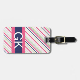 Etiqueta púrpura y rosada del equipaje del