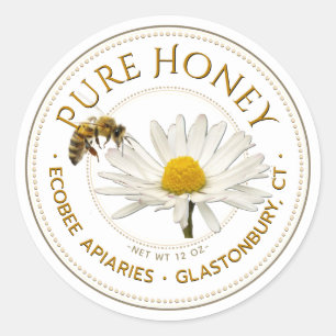 Etiqueta realista de miel de abeja y margarita bla