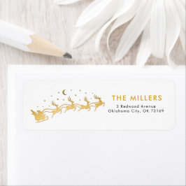 Etiqueta Santa de oro volando en trineo con reno