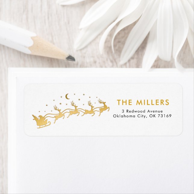 Etiqueta Santa de oro volando en trineo con reno (In situ)