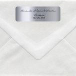 Etiqueta Silver metallic elegant shiny return address<br><div class="desc">A faux silver metallic looking background. Template for names and address,  black colored letters. With a large snow crystal as decor,  almost invisible behind the text. The names are written with a modern hand lettered style script. Black letters. Perfect for  Christmas mail or your  everyday mail.</div>