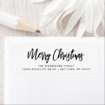 Etiqueta Simple Calligraphy Merry Christmas Black and White<br><div class="desc">A simple,  stylish return address label for your holiday greeting cards. The words "Merry Christmas" appear in black handwriting calligraphy script on a white background. Add your name and address in black sans serif.</div>