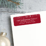 Etiqueta Snowdrift Cranberry Holiday Return Address<br><div class="desc">Add a festive touch to your holiday envelopes with our wintry-themed return address labels! The labels display your name and address in white modern lettering with white snow flurries on a cranberry-colored background. The snowflake return address labels are perfect to use for Christmas cards, holiday party invites, and everyday correspondence....</div>