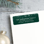 Etiqueta Snowdrift Green Holiday Return Address<br><div class="desc">Add a festive touch to your holiday envelopes with our wintry-themed return address labels! The labels display your name and address in white modern lettering with white snow flurries on a spruce green background. The snowflake return address labels are perfect to use for Christmas cards, holiday party invites, and everyday...</div>