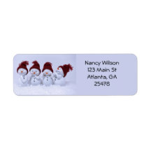 Un cuarteto de muñecos de nieve
