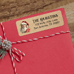 Etiqueta Vintage Christmas Santa Claus Face Return Address<br><div class="desc">Esta etiqueta de dirección de retorno muestra un Santa Claus de época en un fondo de papel kraft. Coordina con la vintage tarjeta de Navidades de Santa Claus. Ideal para enviar tu correo de vacaciones. Diseñado para ti por Blackberry Boulevard.</div>