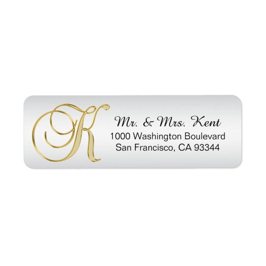 Etiqueta Vuelta de plata del sobre de la letra "K" del