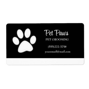 Etiqueta White Dog Paw sobre el Mascota negro Grooming Serv