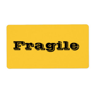 Etiquetas de mudanza frágiles en amarillo-naranja