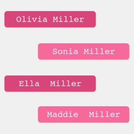 Etiquetas de nombres impermeables rosadas en la es