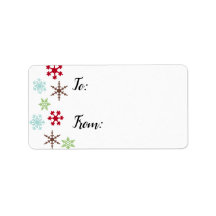 Etiquetas de regalo con copos de nieve en colores
