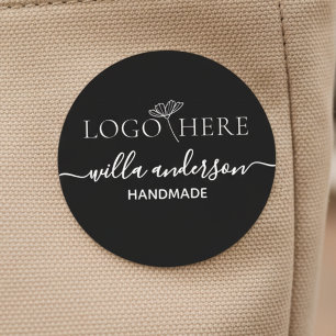 Etiquetas logotipo personalizado y ropa de tela negra redond