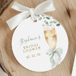 Etiquetas Para Recuerdos Botanical Champagne Bridal Shower Favor Tags<br><div class="desc">Celebrate the bride-to-be with these elegant favor tags, featuring a delicate watercolor champagne flute adorned with a soft sage green bow and lush eucalyptus greenery. The design elegantly incorporates the event details and a personalized name, making it a perfect addition to bridal shower favors. These tags add a sophisticated and...</div>