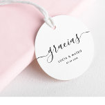 Etiquetas Para Recuerdos Calligrafía Español Gracias Boda Gracias<br><div class="desc">Presentamos nuestra "Caligrafía Española Gracias Boda Gracias Favor Tags"! Son etiquetas elegantes para darte las gracias a los bodas. Estas etiquetas tienen la palabra 'gracias' escrita en caligrafía sofisticada. Puede personalizares con el nombre y la fecha de su evento. ¡Son una forma elegante de agradecerle a su boda!</div>