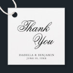 Etiquetas Para Recuerdos Gracias Elegante Boda de caligrafía blanca negra<br><div class="desc">Elegante tipografía etiquetas de favores de boda con un diseño simple con el mensaje "Gracias" en caligrafía negra y sus nombres y fecha abajo, sobre un fondo blanco. Las fuentes y los colores de fondo pueden cambiarse a los colores que desee. Estas etiquetas elegantes y elegantes son ideales para un...</div>
