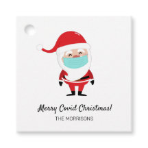 Navidades de Merry Covid Santa Claus usando una má