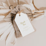 Etiquetas Para Regalos Boda de caligrafía Minimalista de oro Gracias<br><div class="desc">Estos sellos dorados y minimalistas bodas de caligrafía le agradecen son perfectos para una recepción de bodas rústica. El diseño, sencillo y elegante, presenta una tipografía de escritura clásica y elegante en oro. Personalice estas etiquetas con un mensaje breve, sus nombres y la fecha de su boda. Puede cambiar la...</div>